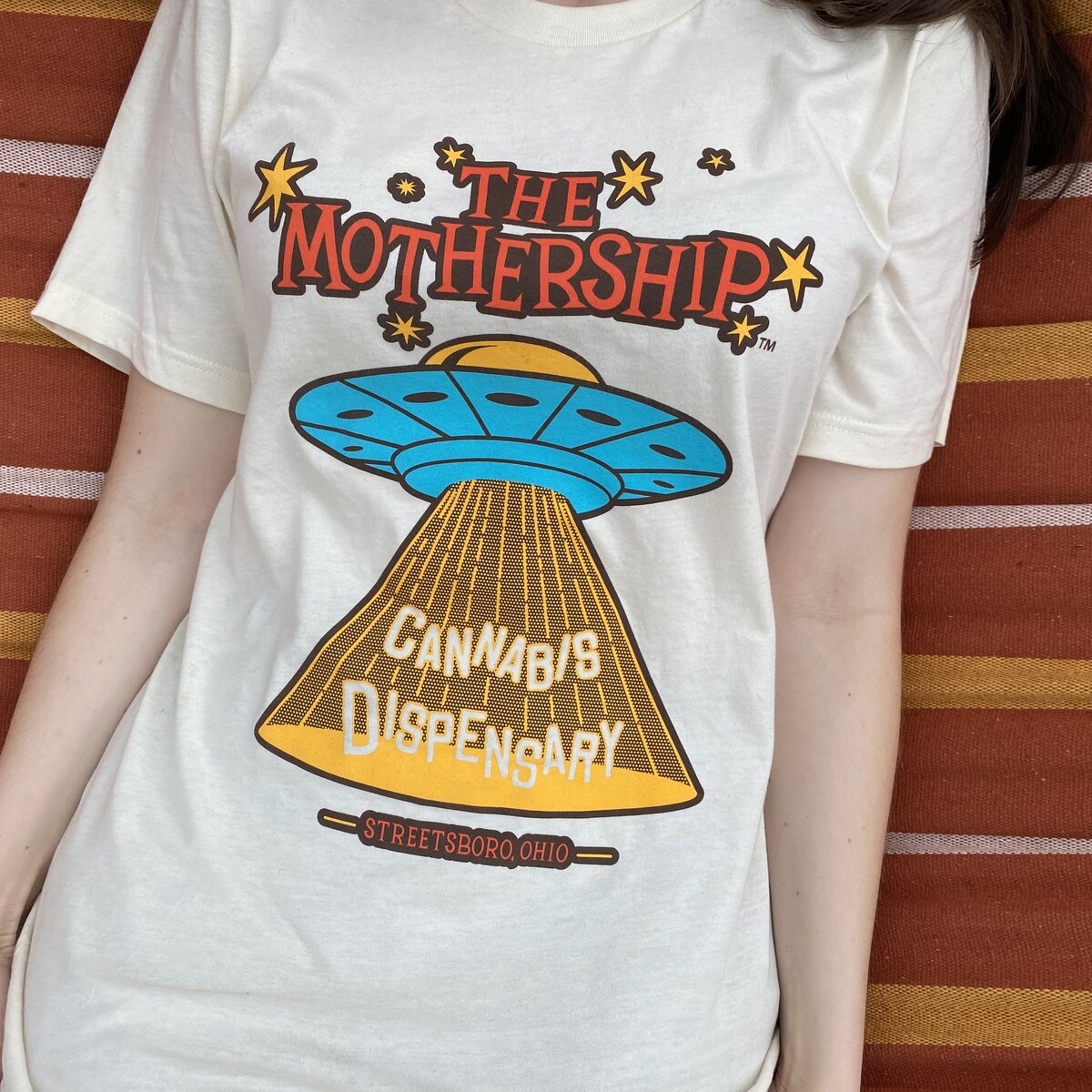 Mothership Cannabis Dispensary t-shirt with UFO design, Streetsboro Ohio