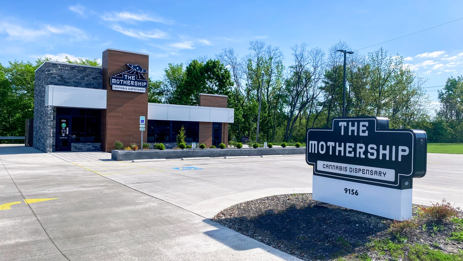 The Mothership Cannabis Dispensary exterior in Streetsboro, Ohio: building, parking lot, and roadside sign at 9156
